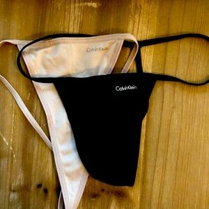 Calvin Klein Thong Lingerie, Size Medium. 2-pair, Black and Nude. New with Tags